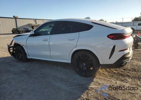2023 BMW X6 xDrive40I z USA, uszkodzony, nr VIN 5UXCY6C0XP9P18843